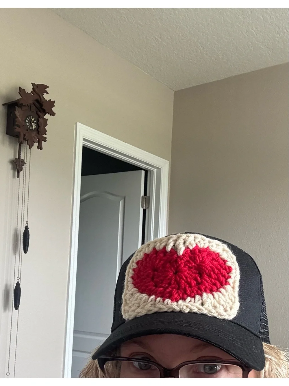 Black Trucker Hat with Red Crochet Heart Patch
